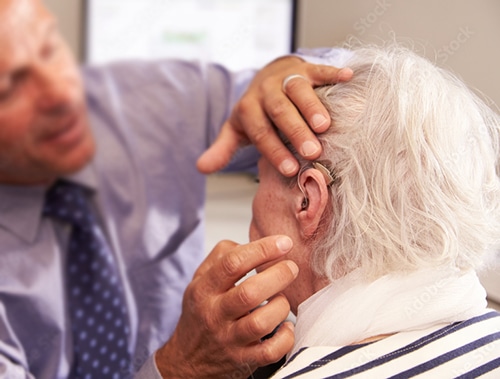 a man wearing a hearing aid